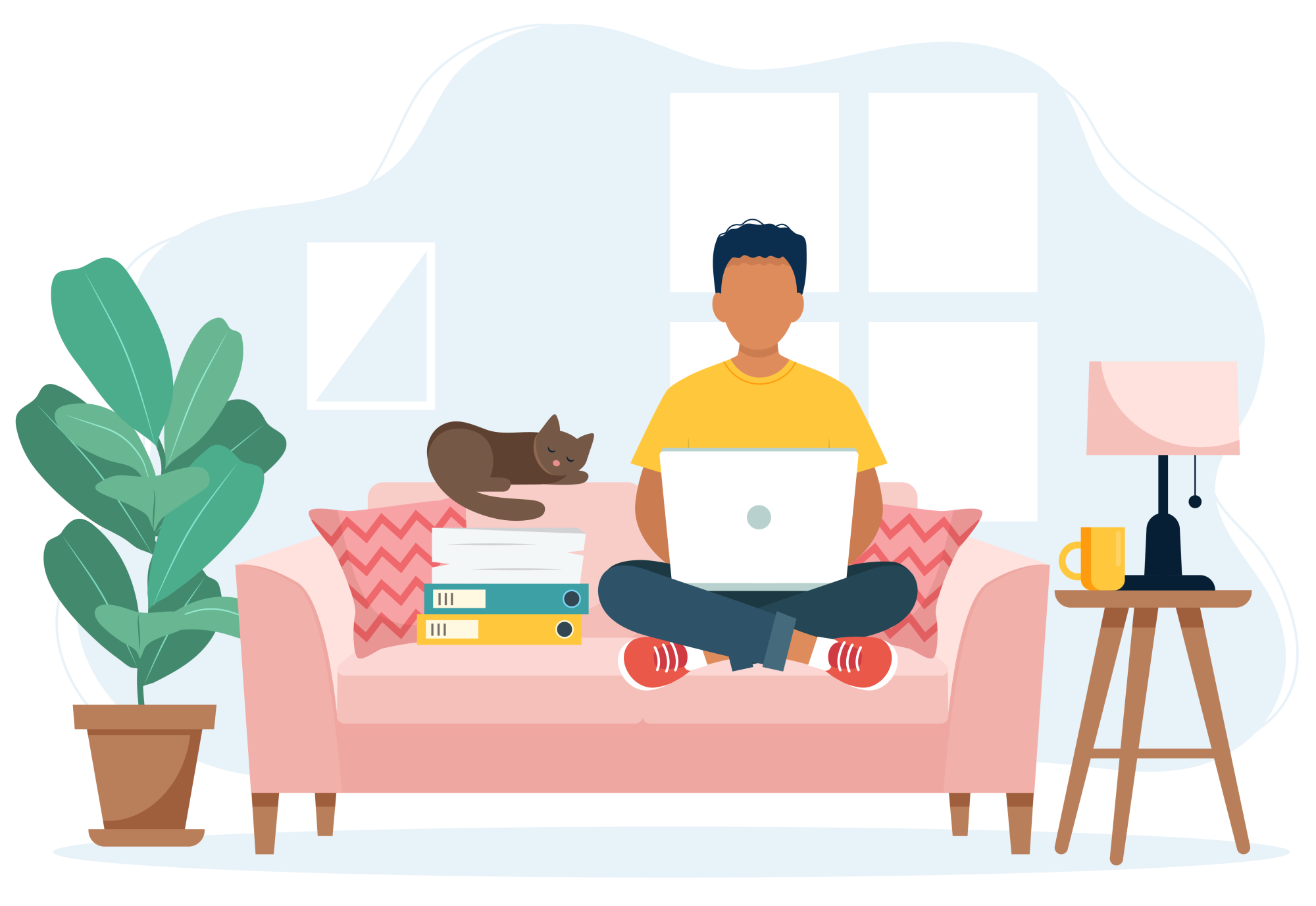 person sitting on couch with laptop