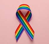 rainbow ribbon with a pink background