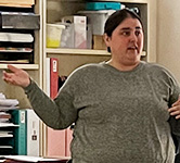 Annie Palumbo presents at the front of her classroom