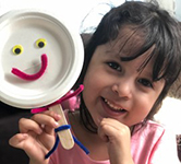 Young girl with an art project